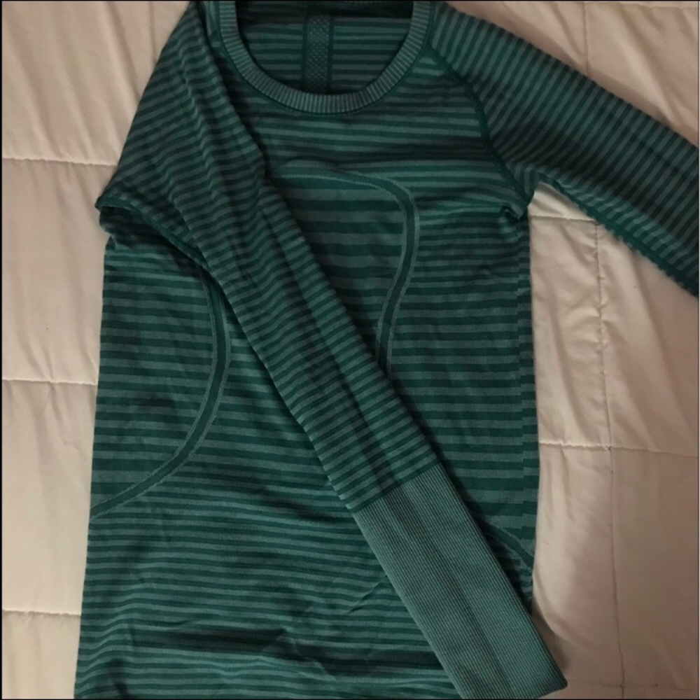 green lululemon long-sleeve athletic top